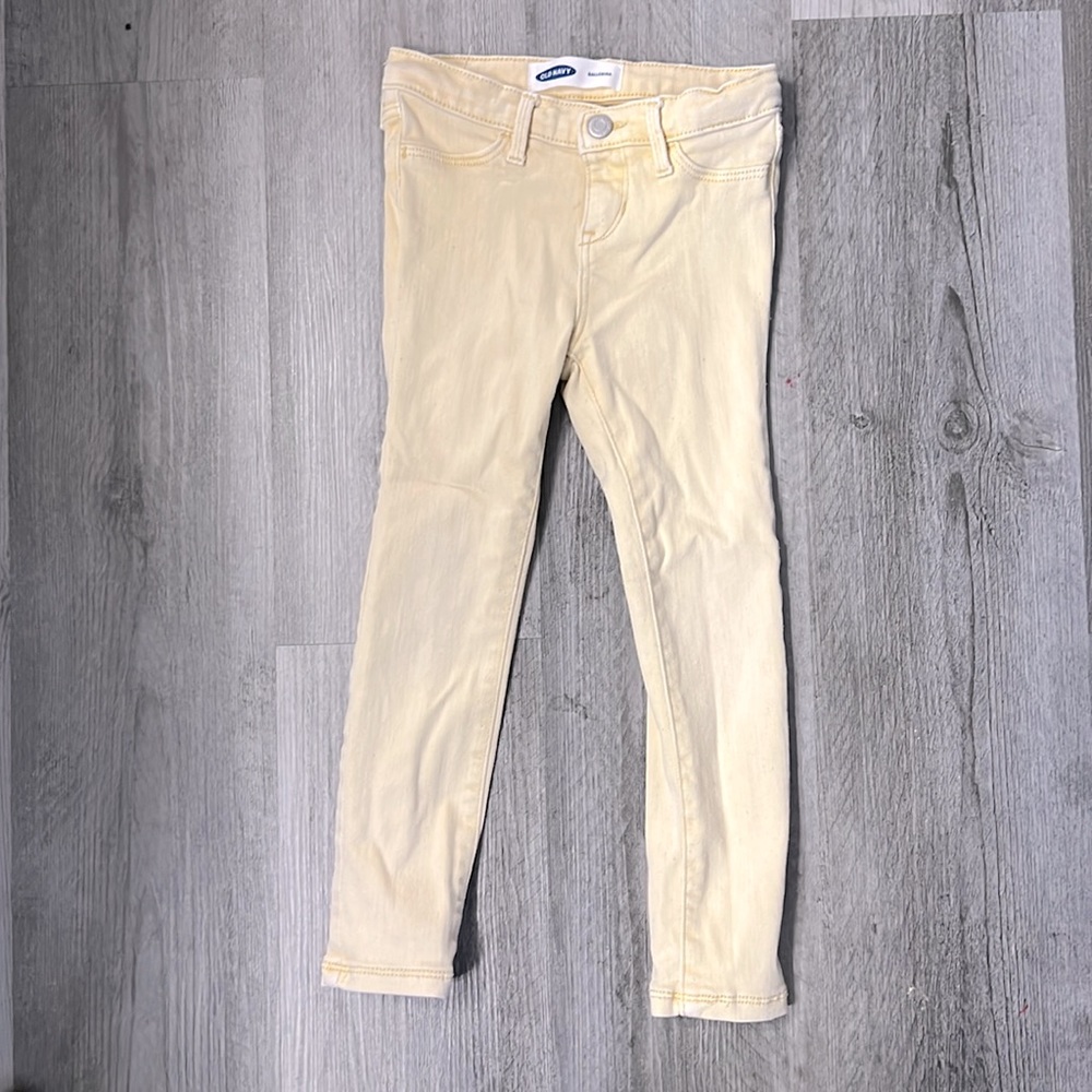 Girls pale yellow jeans